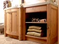 bathroom vanity with bow front in reclaimed pine